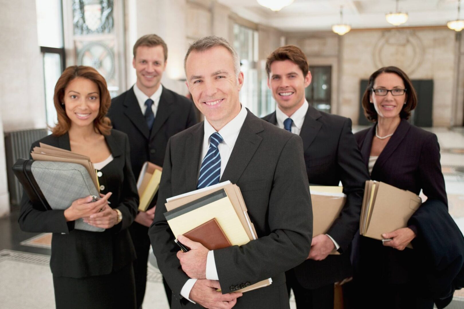 Group of business professionals smiling