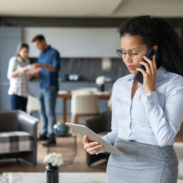 Professional woman on phone in office